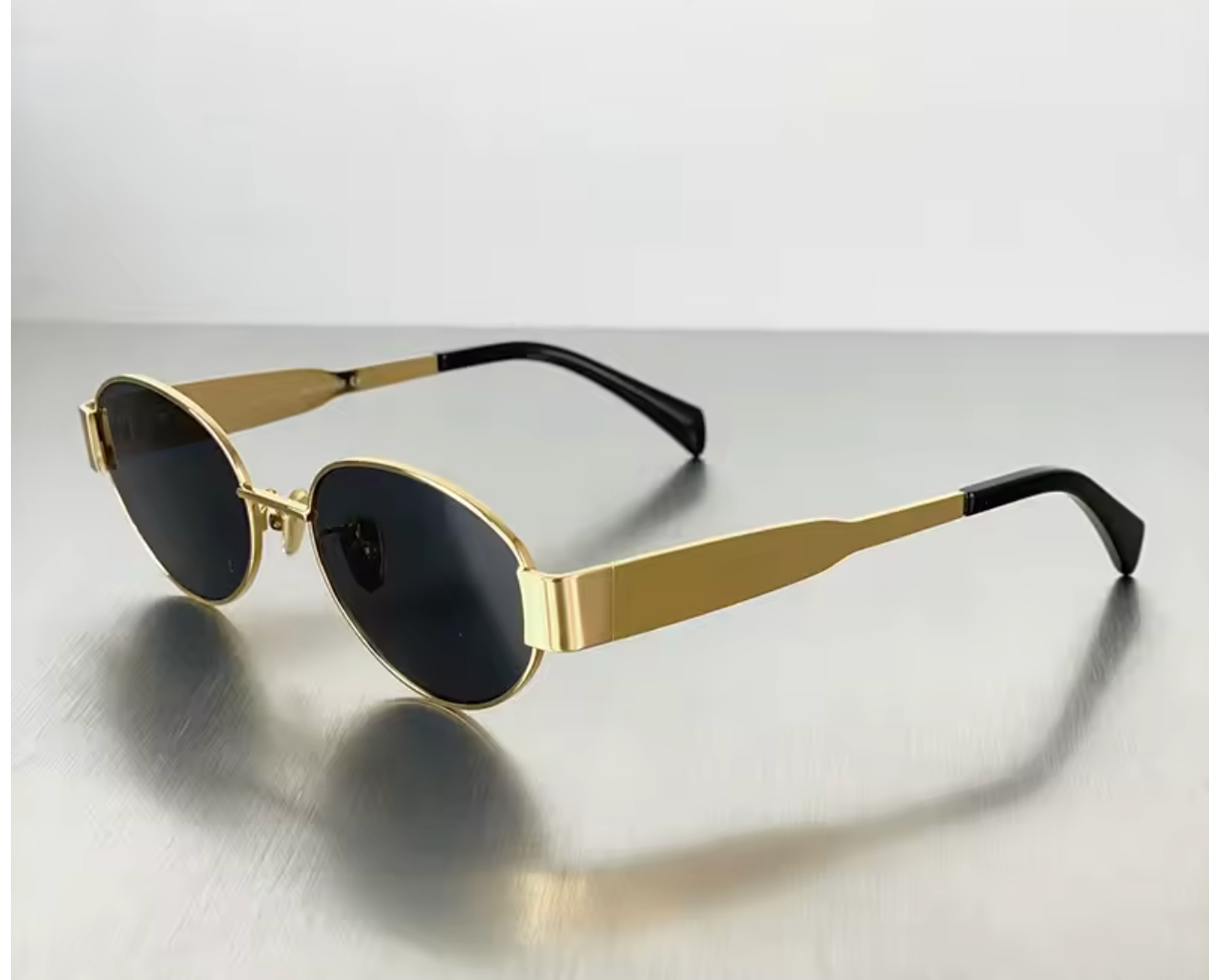 Sleek Oval Gold-Toned Sunglasses