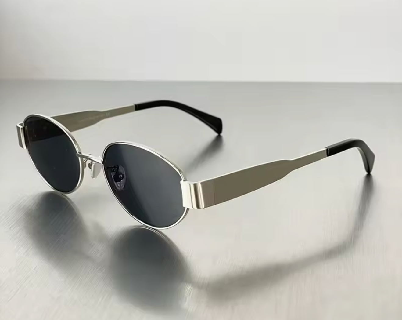 Sleek Oval Gold-Toned Sunglasses